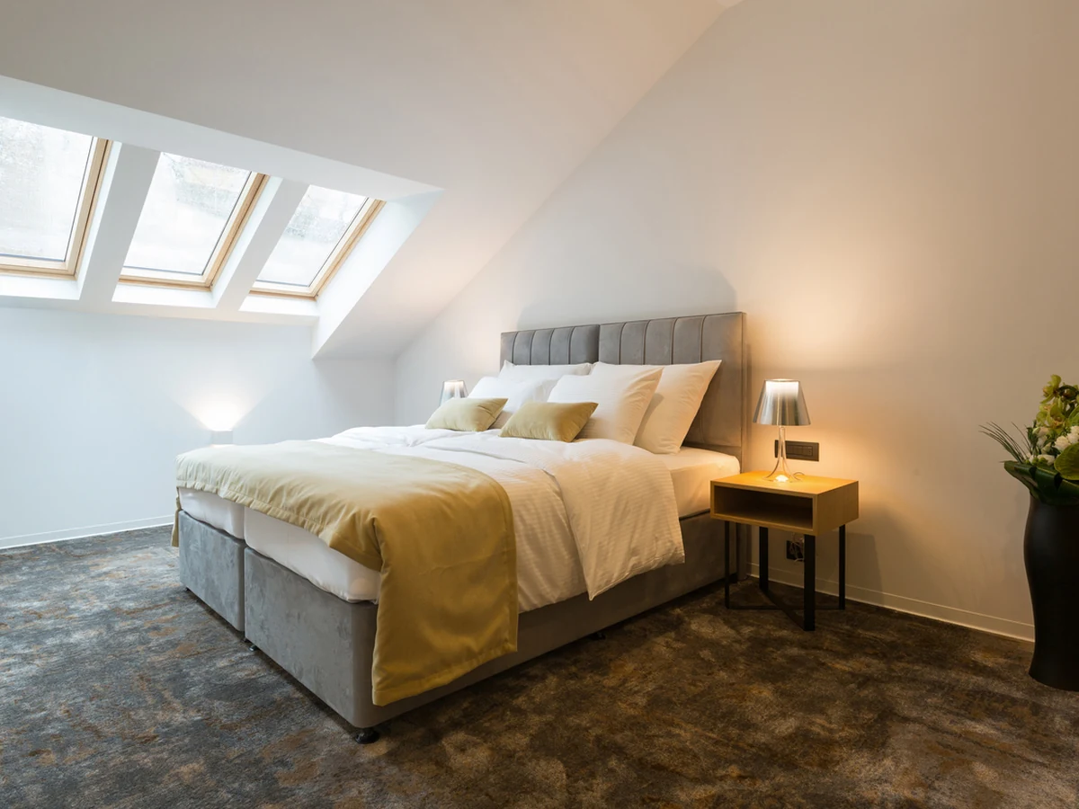 Bedroom painting in Northenden, loft conversion with skylights by Altrincham Decorators