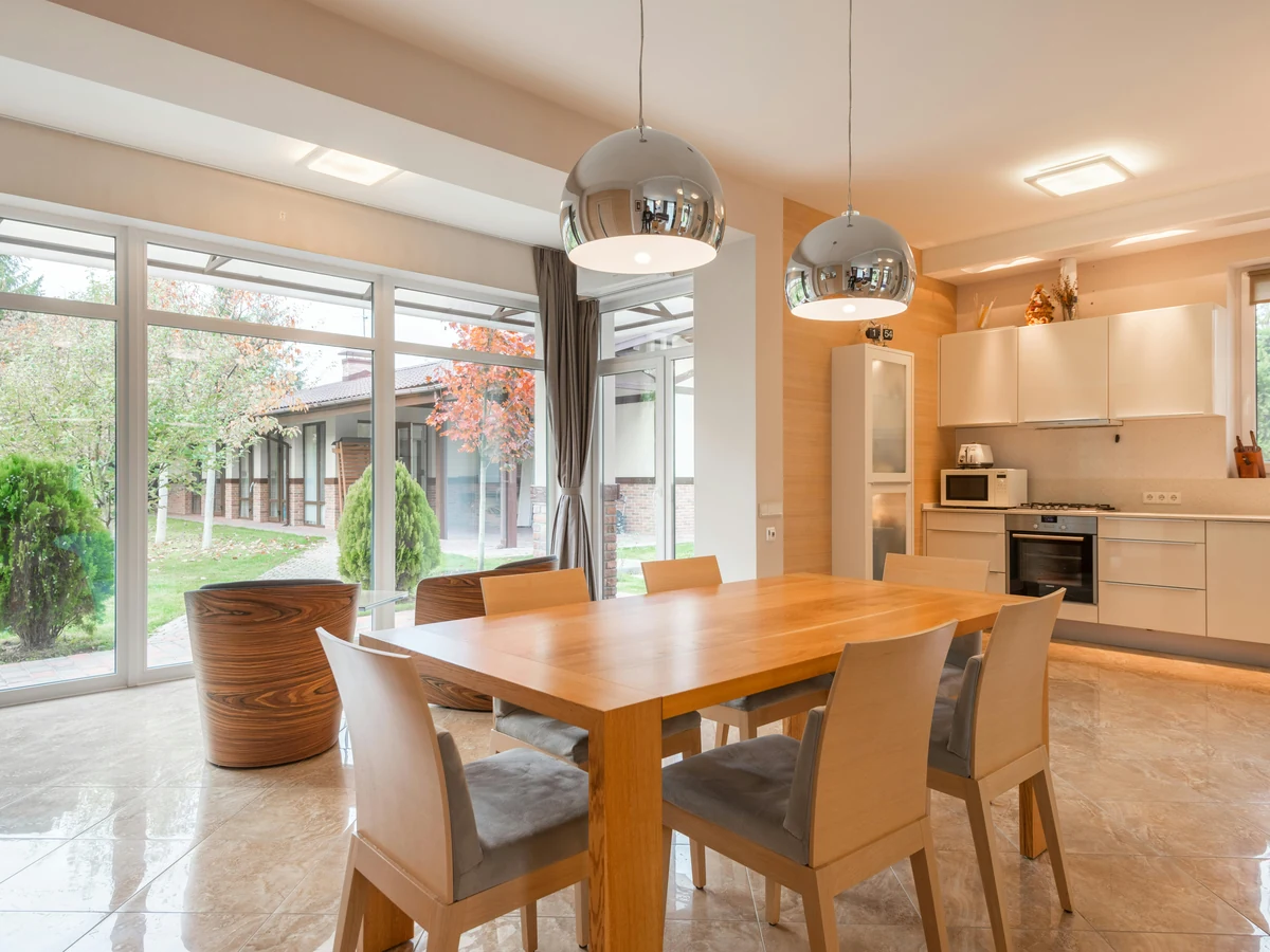 Open plan dining room painting by Altrincham Decorators
