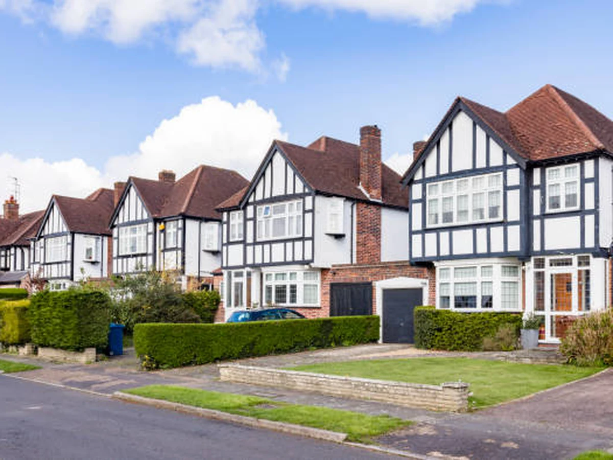 Exterior painting of 1930s mock-Tudor house in Altrincham by professional painters