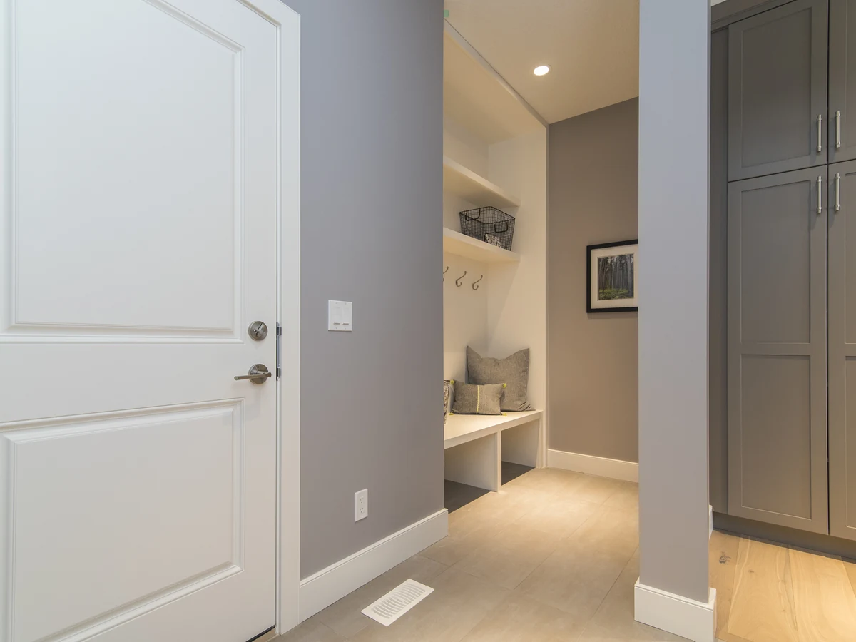 hallway-painting-grey-mudroom-door-altrincham-decorators Interior door painting in Altrincham - grey mudroom door finished by Altrincham Decorators