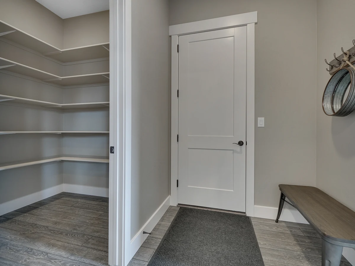 hallway-painting-grey-mudroom-open-altrincham-decorators Grey mudroom with painted door in Altrincham home