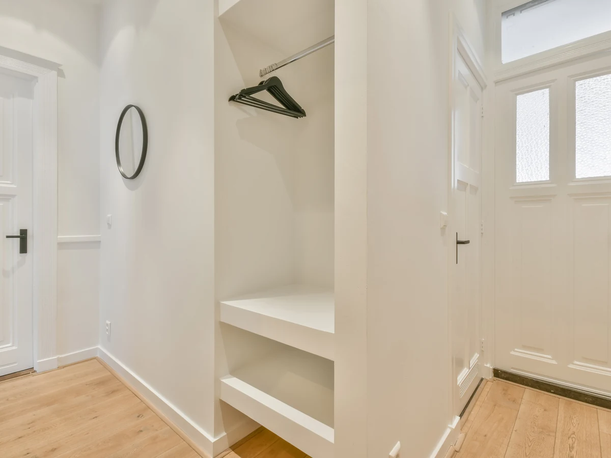 Minimalist white hallway with clean painted walls in Altrincham