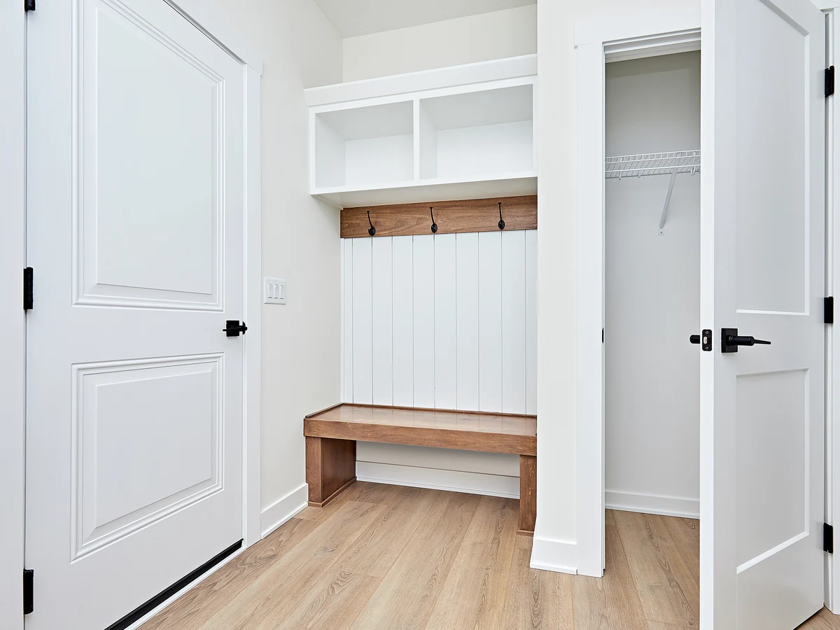 Hallway painting in Hale by Altrincham Decorators, white mudroom finish