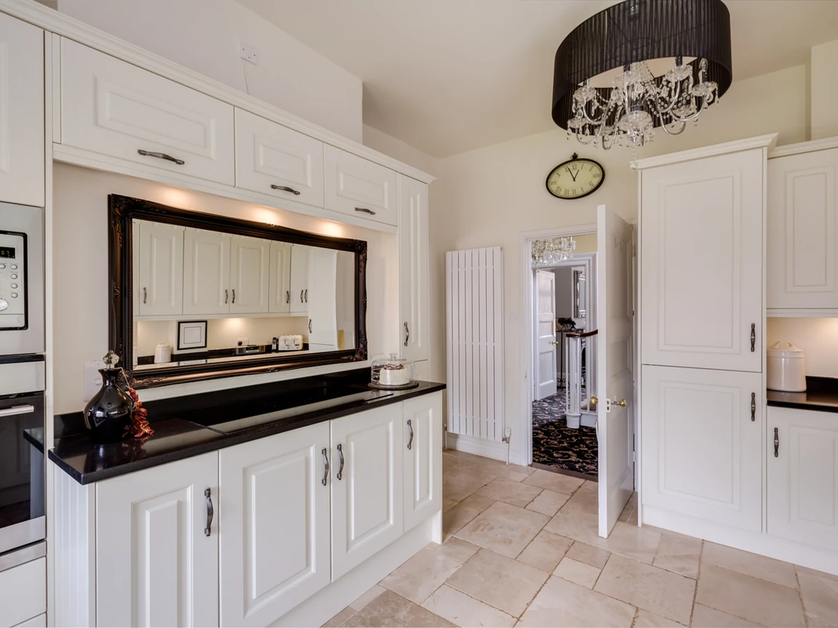 Classic white kitchen with professionally painted cabinets