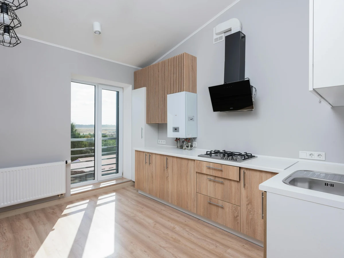 Compact modern kitchen with freshly painted cabinets in Altrincham