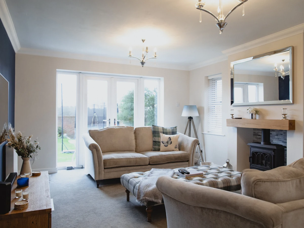 Feature wall painting in Altrincham - blue feature wall living room by Altrincham Decorators