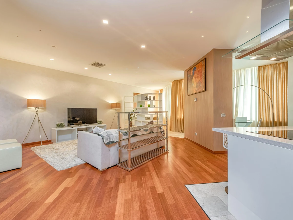 Open plan lounge painting by Altrincham Decorators